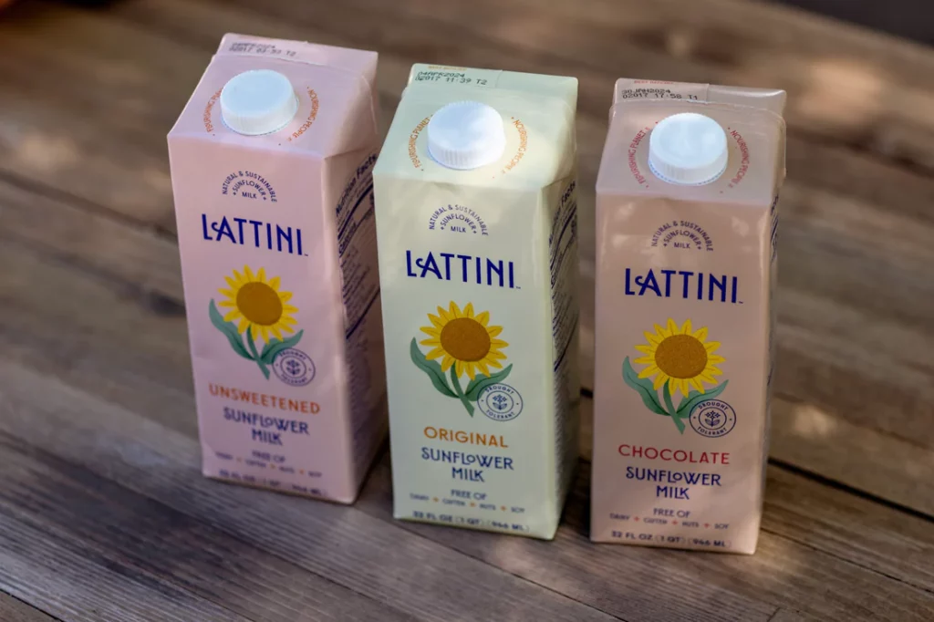 Lattini's assortment of original, unsweetened, and chocolate sunflower milk