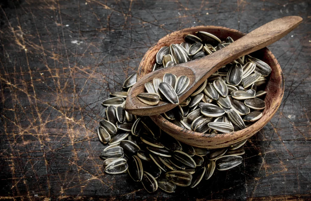 sunflower seeds in a bowl on a table